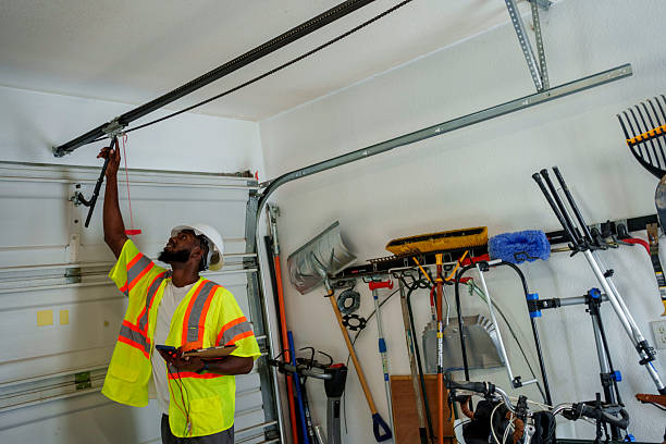 Professional Garage Door Panel Replacement technician working in Rankin County County, MS